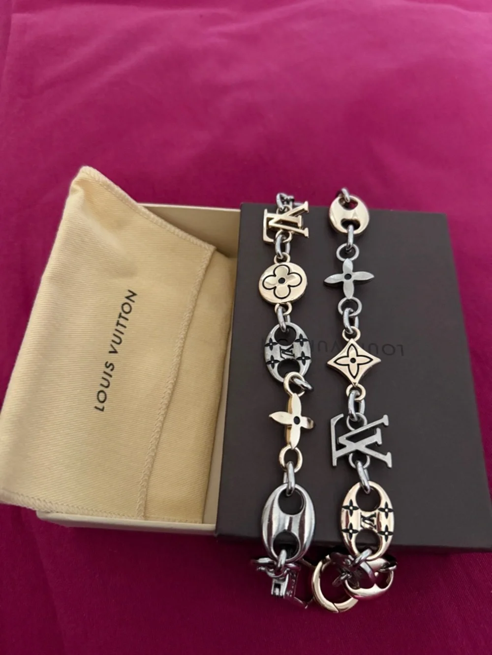 Louis Vuitton Silver Logo Charm Chain Belt on Pink Background - Picture 1 of 6